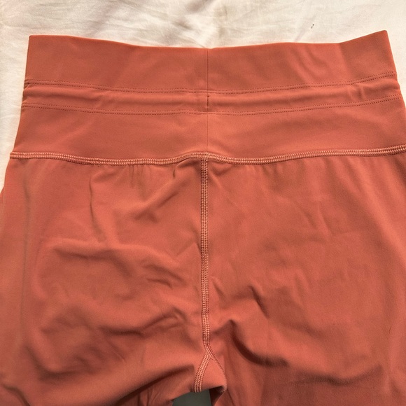 Vuori Women's Leggings in Warm Coral - Picture 1 of 5